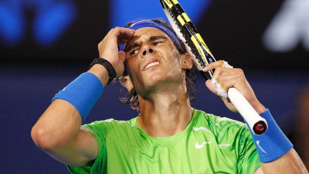 Rafael Nadal loses a point during the men's final against Novak Djokovic on January 30, 2012.