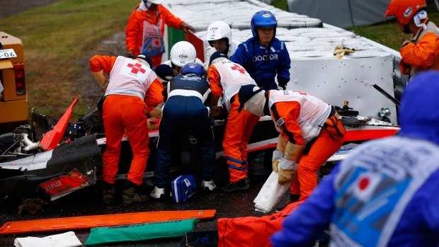 Horror crash: Jules Bianchi treated after the incident at the Suzuka Circuit.