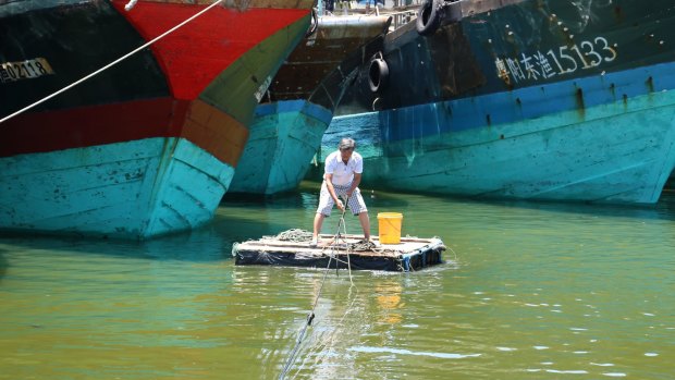 A fisherman at work in Tanmen, in China's southern Hainan Province.