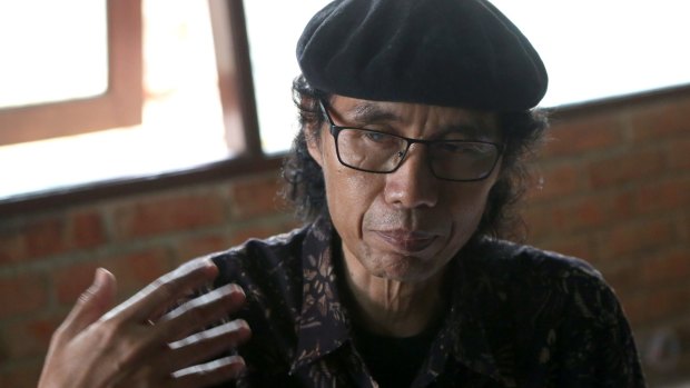 Indonesian activist Sandyawan Sumardi works with the people of Bukit Duri.