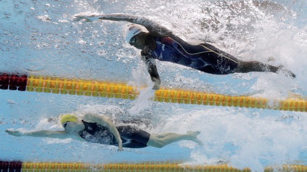 From top: American Simone Manuel and Australian Cate Campbell in the women's 50m freestyle heat on Day 7 of Rio 2016.