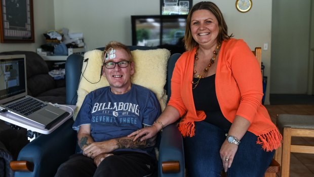 Window to the world: Glenn Sargood, who has motor neurone diseases and uses a NeuroSwitch device to engage with the wider world, with his wife, Rachel.