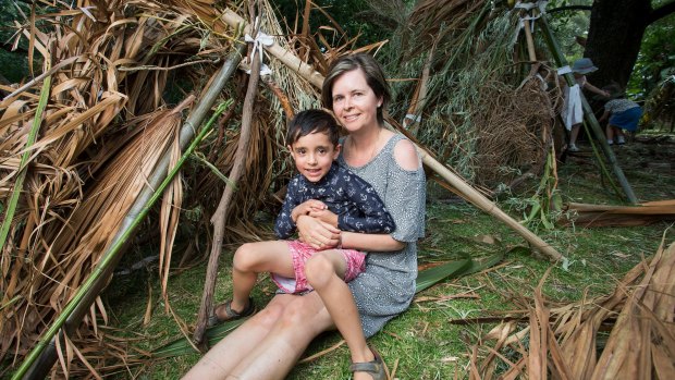 Angela Boyson and her son Oscar with their cubby at Melbourne's Royal Botanic Gardens.