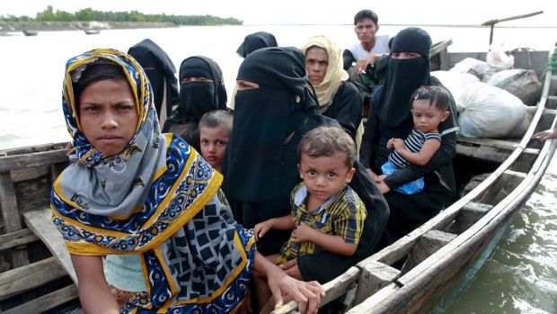 Three boats carrying ethnic Rohingya fleeing violence in Myanmar capsized on the way to Bangladesh on Thursday killing 26 women and children.