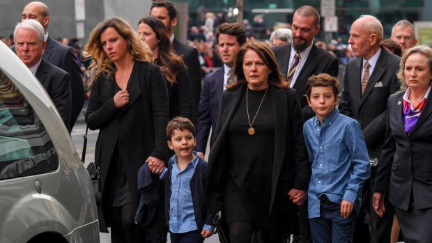 Lou Richards' family outside the cathedral. 