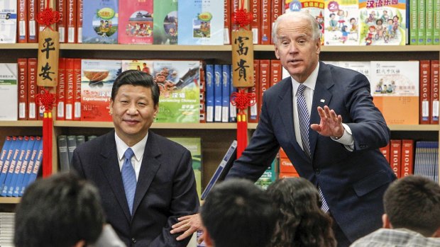 Xi with US Vice-President Joe Biden taking questions from students in California in 2012.