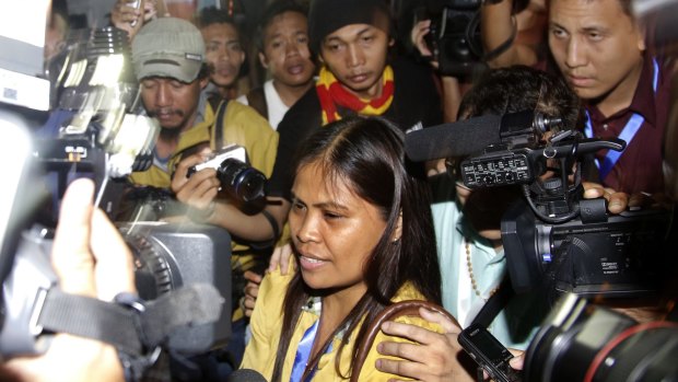 Marites Veloso, sister of Filipina Mary Jane Veloso, talks to the media after visiting her sister on Wednesday.