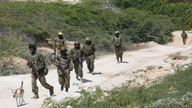African Union soldiers patrol a district near the Somali capital, Mogadishu, after several al-shabab attacks in Mogadishu in recent days. 