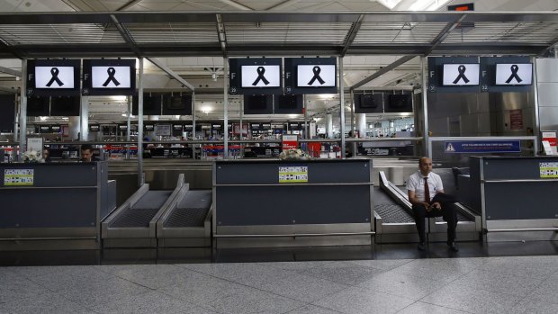 An official sits in Ataturk Airport in Istanbul ahead of a memorial event on June 30.