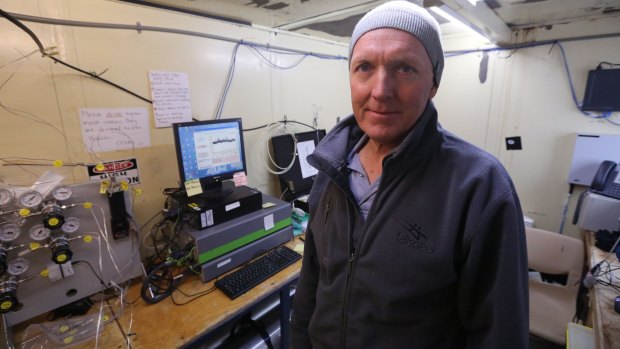 David Etheridge, from CSIRO's Oceans & Atmosphere division, at work in a research hut near the Antarctic base of Casey.