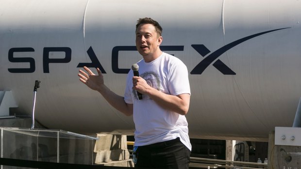 SpaceX CEO Elon Musk congratulates teams competing on the Hyperloop Pod Competition II at SpaceX's Hyperloop track in Hawthorne, California, in August.
