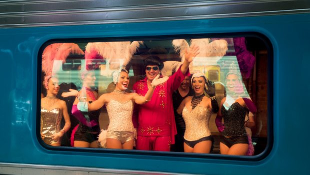 Showgirls, Elvis and a few Priscillas board the Elvis Express.
