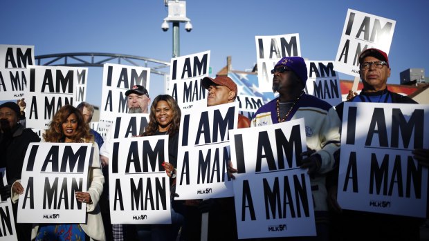 Demonstrators hold "I am a man" signs during a 50th anniversary re-enactment of the sanitation workers' strike in Memphis last Wednesday.