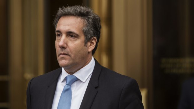 Michael Cohen, personal lawyer to US President Donald Trump, exits Federal Court in New York on Monday.