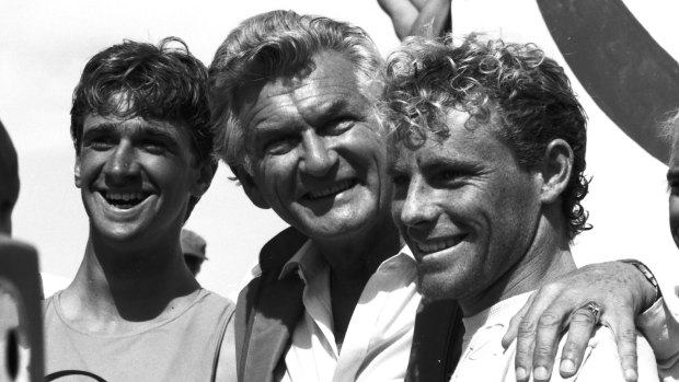 Prime Minister Bob Hawke with surfers Barton Lynch (left) and Tom Carroll (right), at Bondi Beach in 1984.