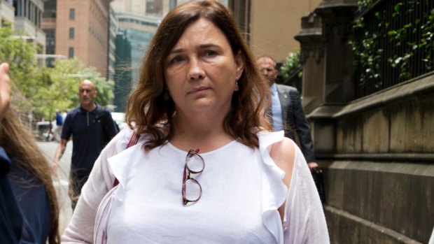 Kimberley McGurk, wife of murdered businessman Michael McGurk, leaves the NSW Supreme Court after giving evidence in the trial of Ron Medich on Thursday.