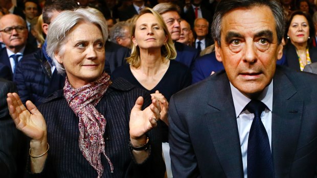 Francois Fillon, right, with his wife Penelope during a rally of his Republican Party in Paris in November.