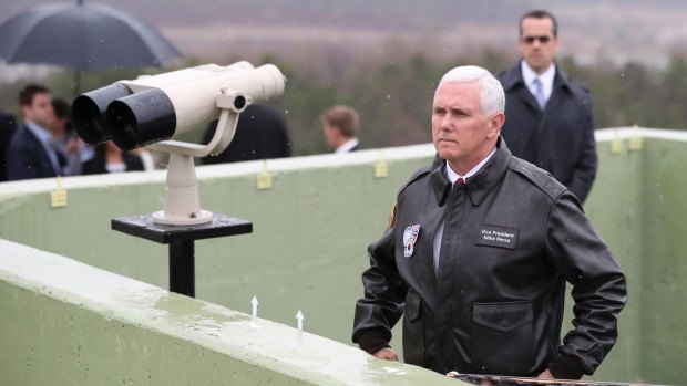 US Vice-President Mike Pence looks at the North Korean side from Observation Post Ouellette in the Demilitarized Zone (DMZ) in April.
