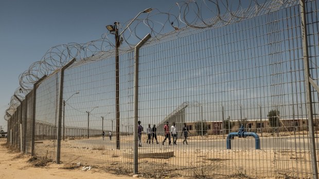 Holot, in Israel's southern Negev desert, is an "open prison" where inmates can go out but need to be back before 10pm in order not to be transferred to a closed prison.  