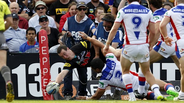 David Simmons goes over in the corner for a disallowed try.