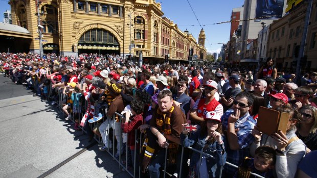 A big crowd turned out in the centre of Melbourne for the 2014 AFL grand final parade.