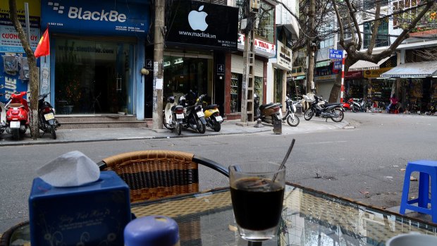 Hanoi. In Vietnam, your coffee comes with a side order or motorbike exhaust fumes.