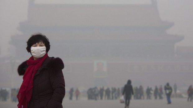 Heavy pollution in Tiananmen Square, Beijing. Federal Minister of the Environment Greg Hunt says there will be no global emissions agreement without India.