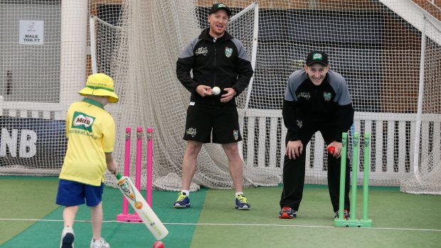 Next generation: Brad Haddin and Peter Nevill pass on their tips.