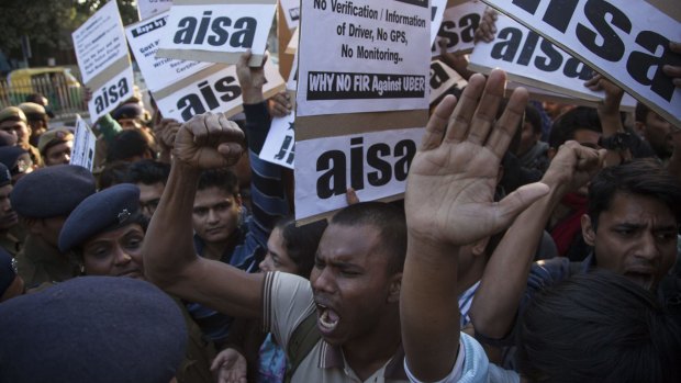 Protestors from All India Students Association (AISA) demonstrate outside the Delhi Police headquarters after an Uber driver allegedly raped a young woman. 