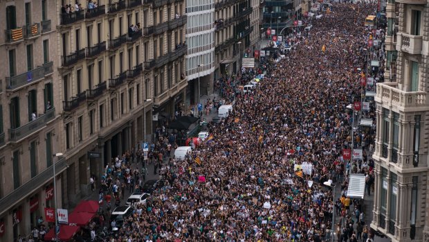 Independence supporters march during a demonstration in downtown Barcelona on Monday.