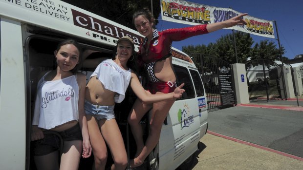 Glitterdolls members, from left, Kirra Morrison, Cassandra Orman and Talia Tate at the entrance to the Summernats. 