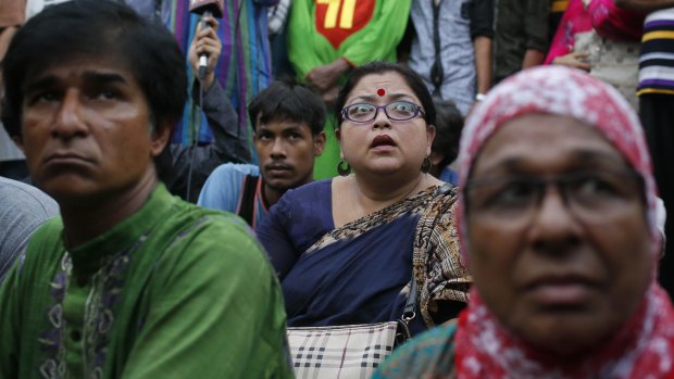 Bangladeshi students and social activists participate in a protest against the killing of a blogger Niloy Neel.