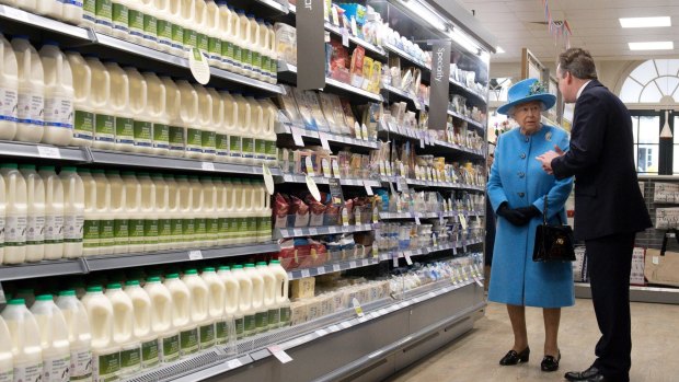 Queen Elizabeth II visits a Waitrose supermarket last year.