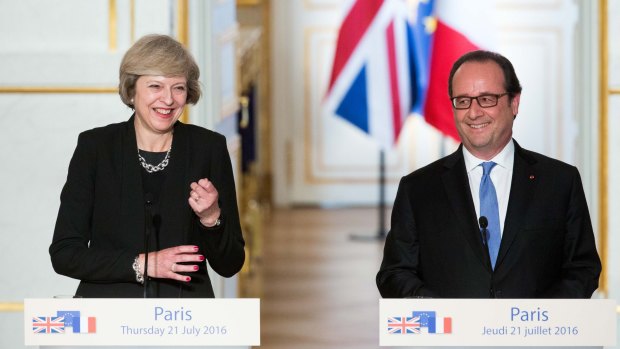 British Prime Minister Theresa May and  French President Francois Hollande at the Elysee Palace on July 21, their first meeting after she took over the government in London.
