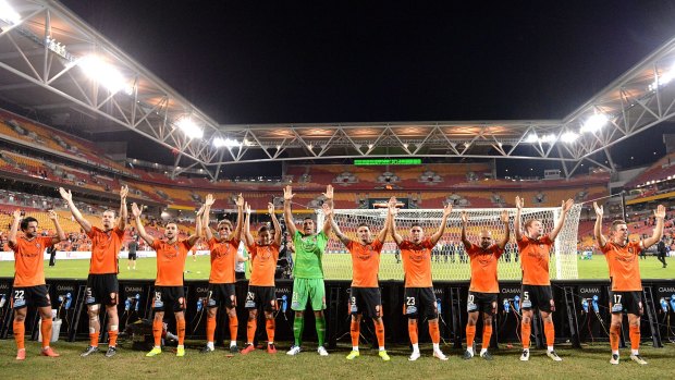 Giving thanks: Roar players celebrate their victory with fans.
