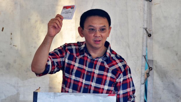 Jakarta's Governor Ahok votes in the first round og elections for governor of Jakarta.
