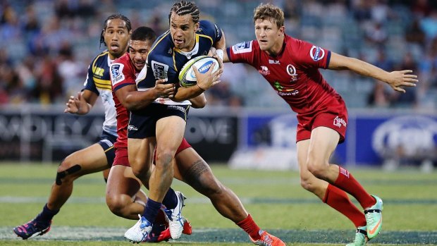 Brumbies five-eighth Matt Toomua takes on the line in the 47-3 win against the Queensland Reds in round one. The Brumbies face the Reds in Brisbane on Saturday night.