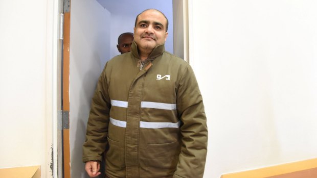 Mohammad al-Halabi enters a hearing at  Beersheba district court in southern Israel on August 4.