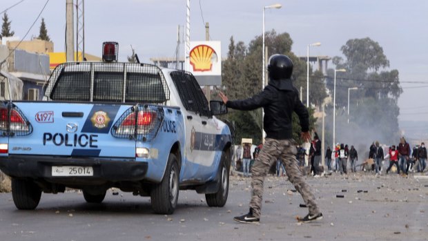 Tunisia has declared a nationwide curfew after clashes between police and more than 1000 young protesters in Ennour demanded more jobs. 