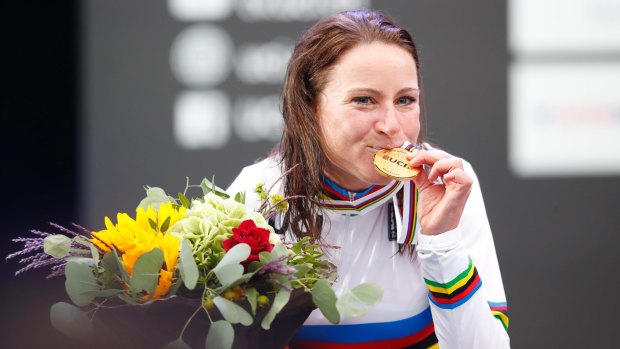 Gold medal winner Annemiek van Vleuten of the Netherlands poses on the podium.