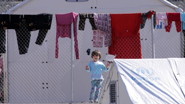 A child is seen at the Moria detention centre in Lesbos on Monday.