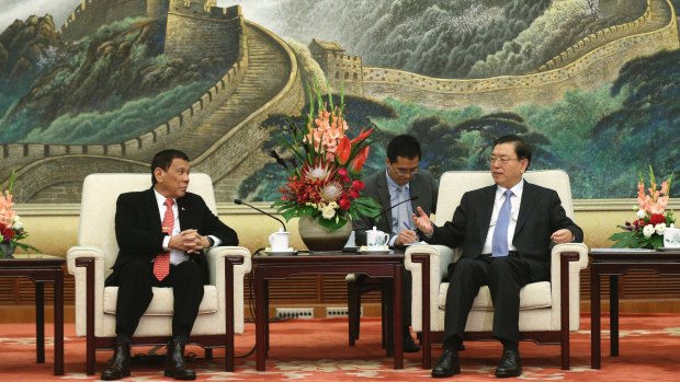Philippines President Rodrigo Duterte, left, meets top Chinese parliamentarian Zhang Dejiang in Beijing in October.