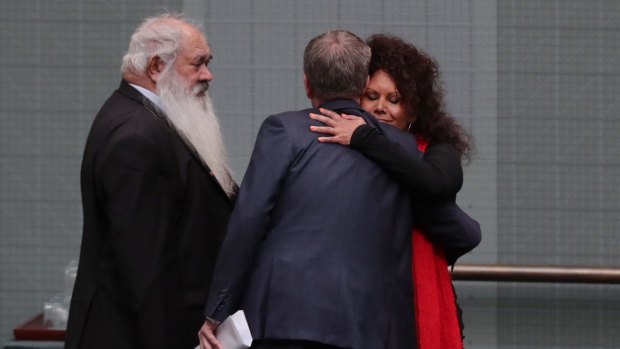 Bill Shorten hugs Senator Malarndirri McCarthy after Malcolm Turnbull delivered the Closing the Gap report at Parliament House.