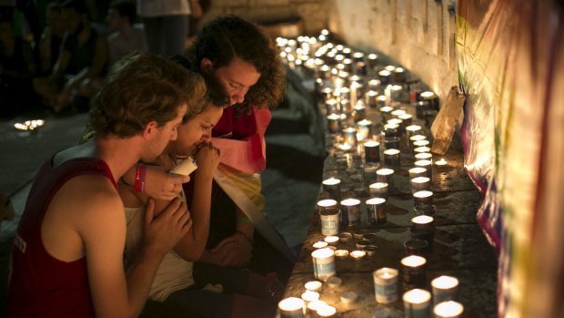 Israeli youths during a candlelight vigil in Tel Aviv, Israel, for Shira Banki, who died on Sunday.