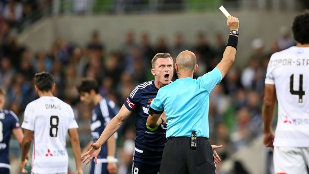 Victory's Besart Berisha argues with the referee after he was given a yellow card.