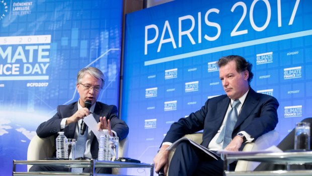 Jean-Laurent Bonnafe, chief executive officer of BNP Paribas , left, and Laurent Mignon, chief executive officer of Natixis  at one of the summit's side events on Monday.