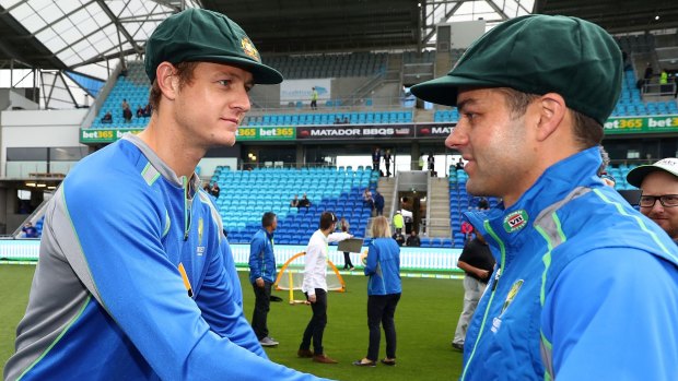 Debuts: Joe Mennie and Callum Ferguson congratulate each other after receiving their Baggy Green caps.