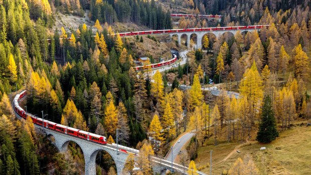 Thousands watched along the route as the 25 four-part electric Capricorn railcars made their way slowly through the stunning Swiss landscape. 
