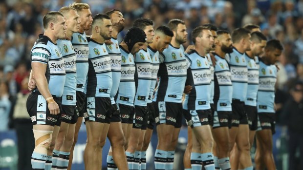 On the brink of history: Sharks captain Paul Gallen lines up with his team.