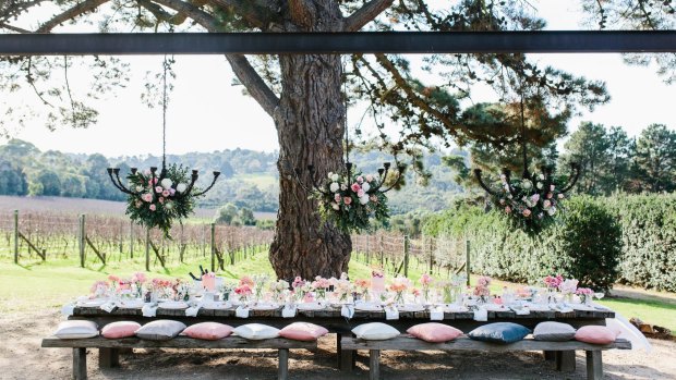 Outdoor dining overlooking the vineyard at Tussie Mussie Vineyard Retreat.